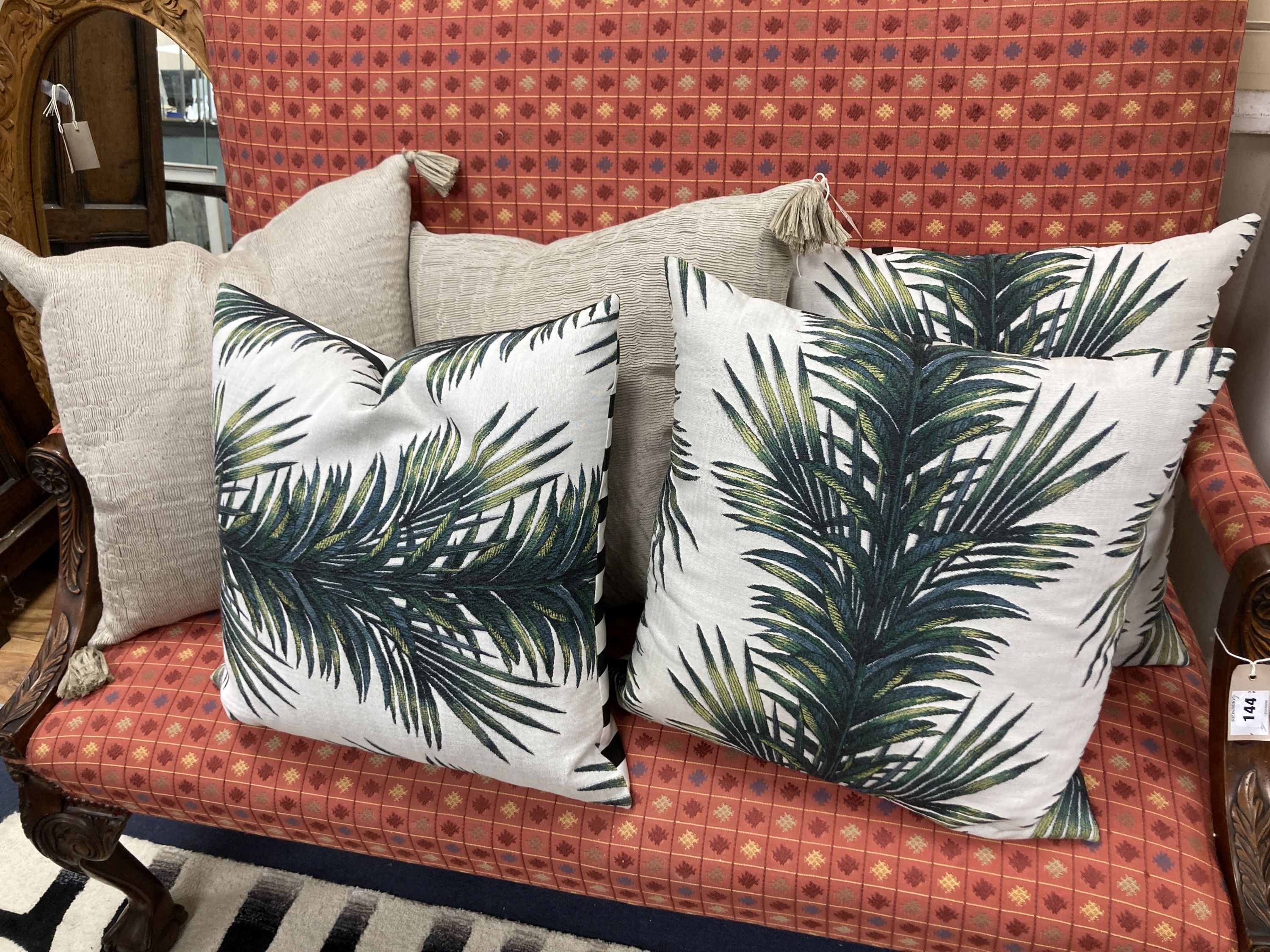 3 Christian Lacroix Palm cushions and 2 Oka cushions.